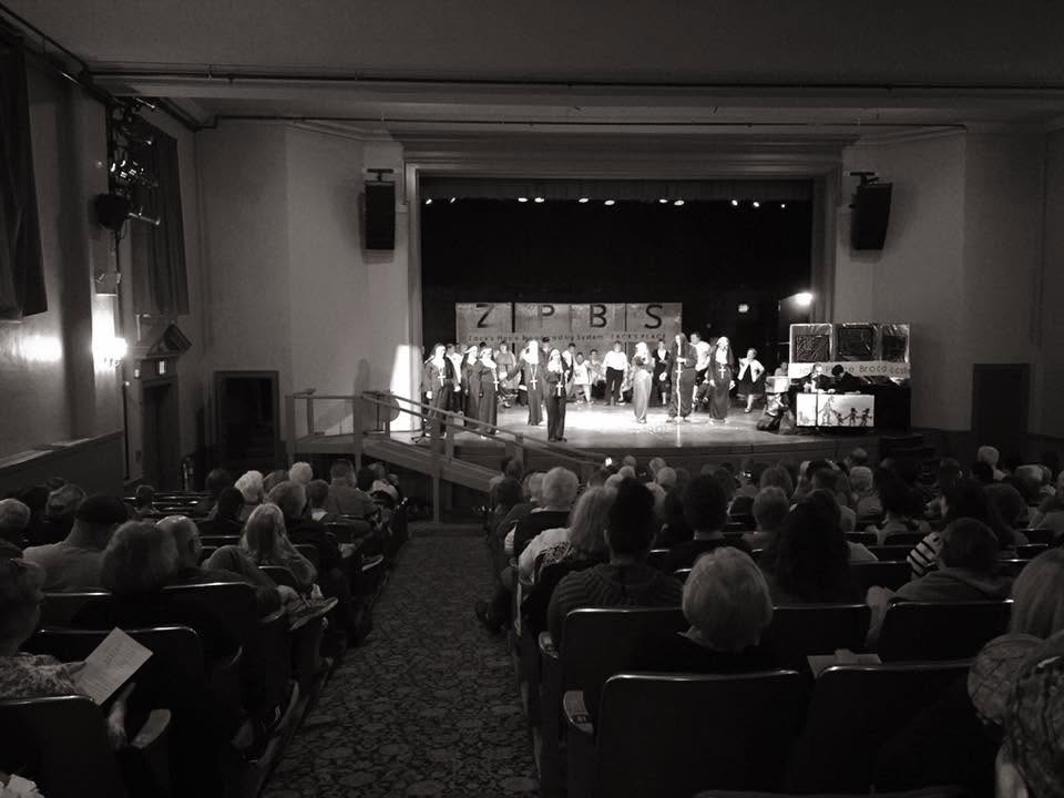 Audience gathered for a performance in the Woodstock Town Hall Theatre.